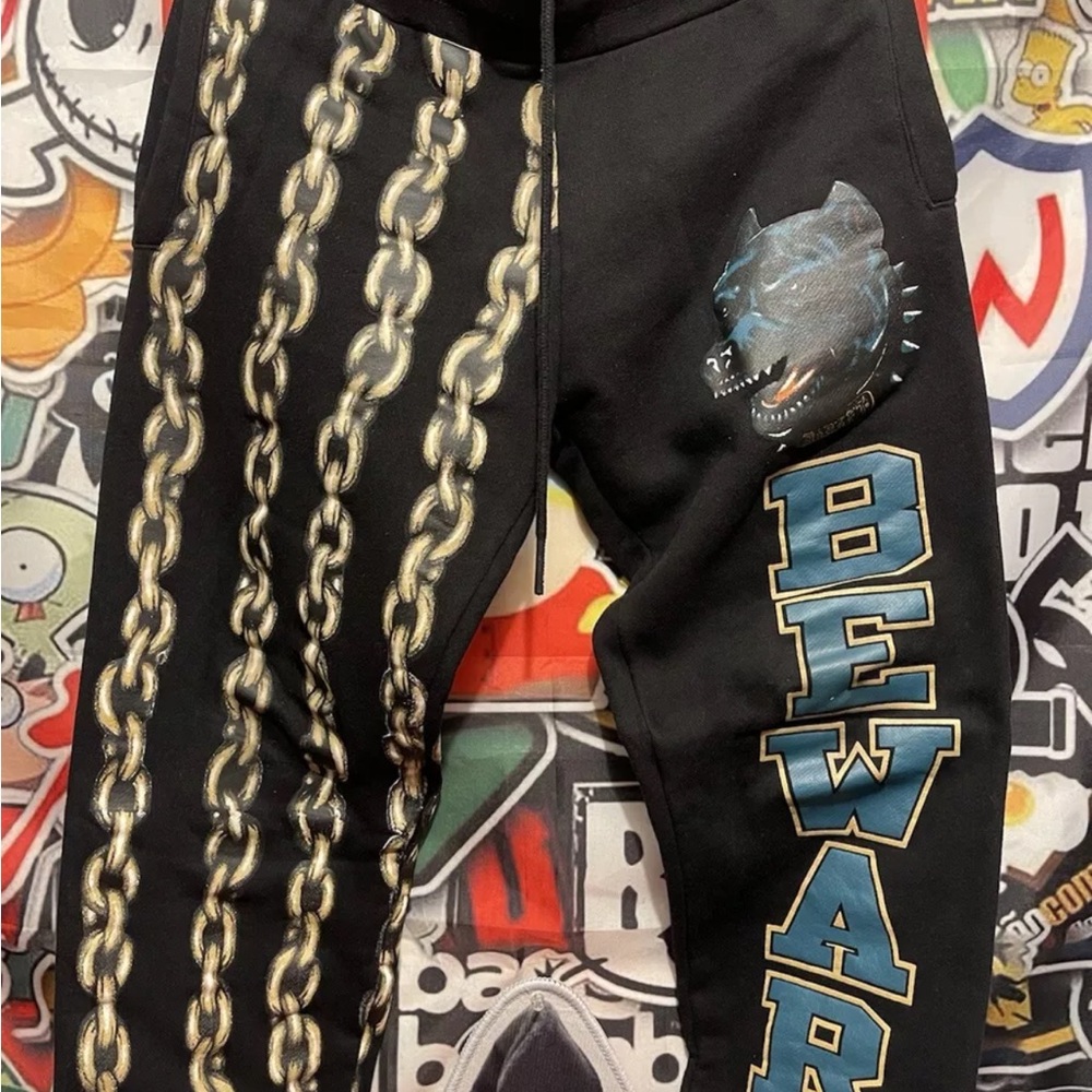 Beware Graphic Joggers with Chain Design ( Market designer )
